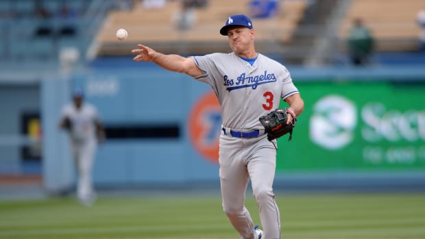 May 12, 2018; Los Angeles, CA, USA; Los Angeles Dodgers former player Steve Sax throws to first base during the Dodgers Alumni game before a game between the Dodgers and the Cincinnati Reds at Dodger Stadium. Mandatory Credit: Orlando Ramirez-USA TODAY Sports